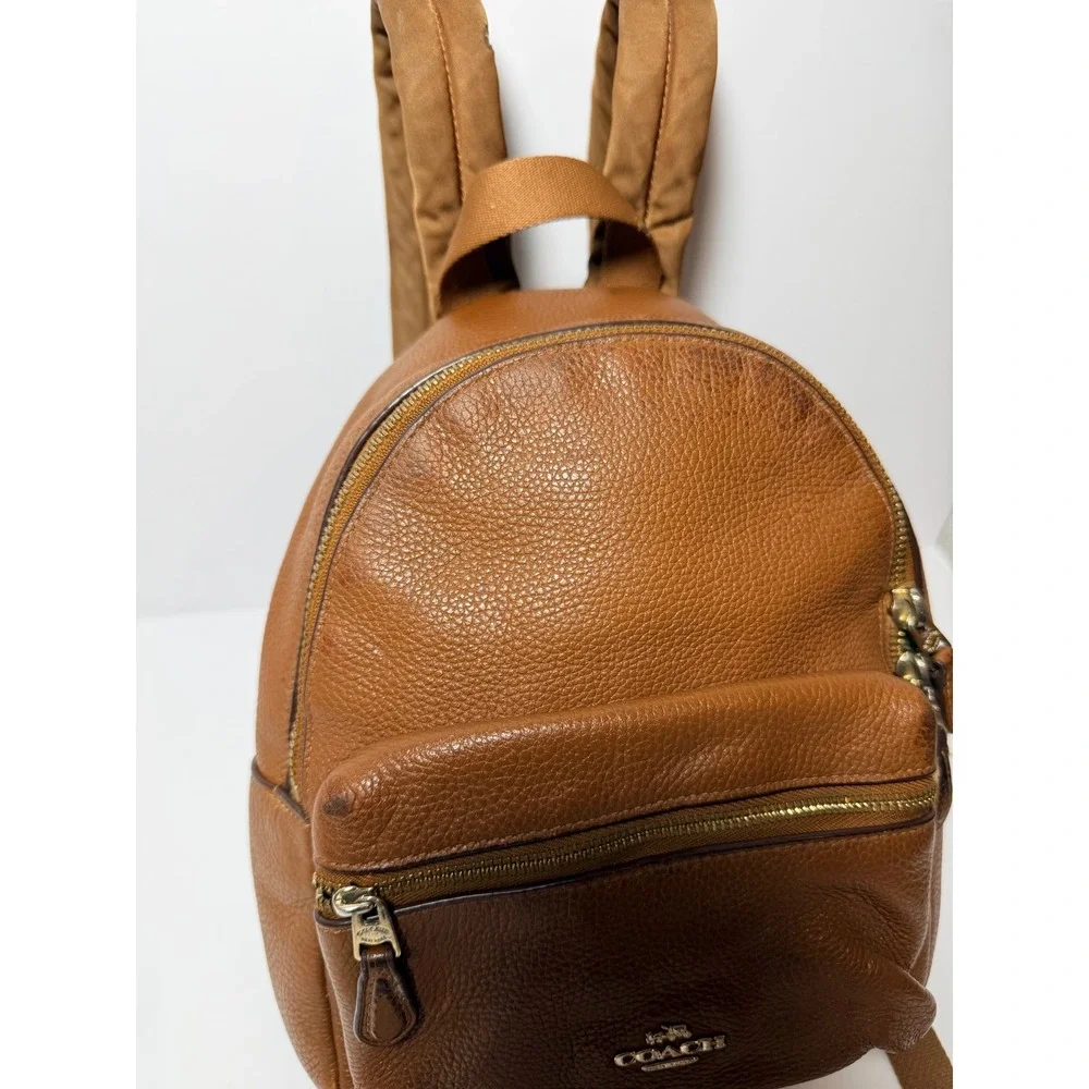 Coach Saddle Leather Mini Charlie Backpack F38263 Pebble Leather Backpack.